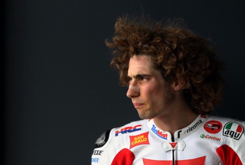 Italian rider Marco Simoncelli watches f