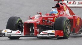 Ferrari Formula One driver Alonso leads Sauber Formula One driver Perez during the Malaysian F1 Grand Prix at Sepang International Circuit
